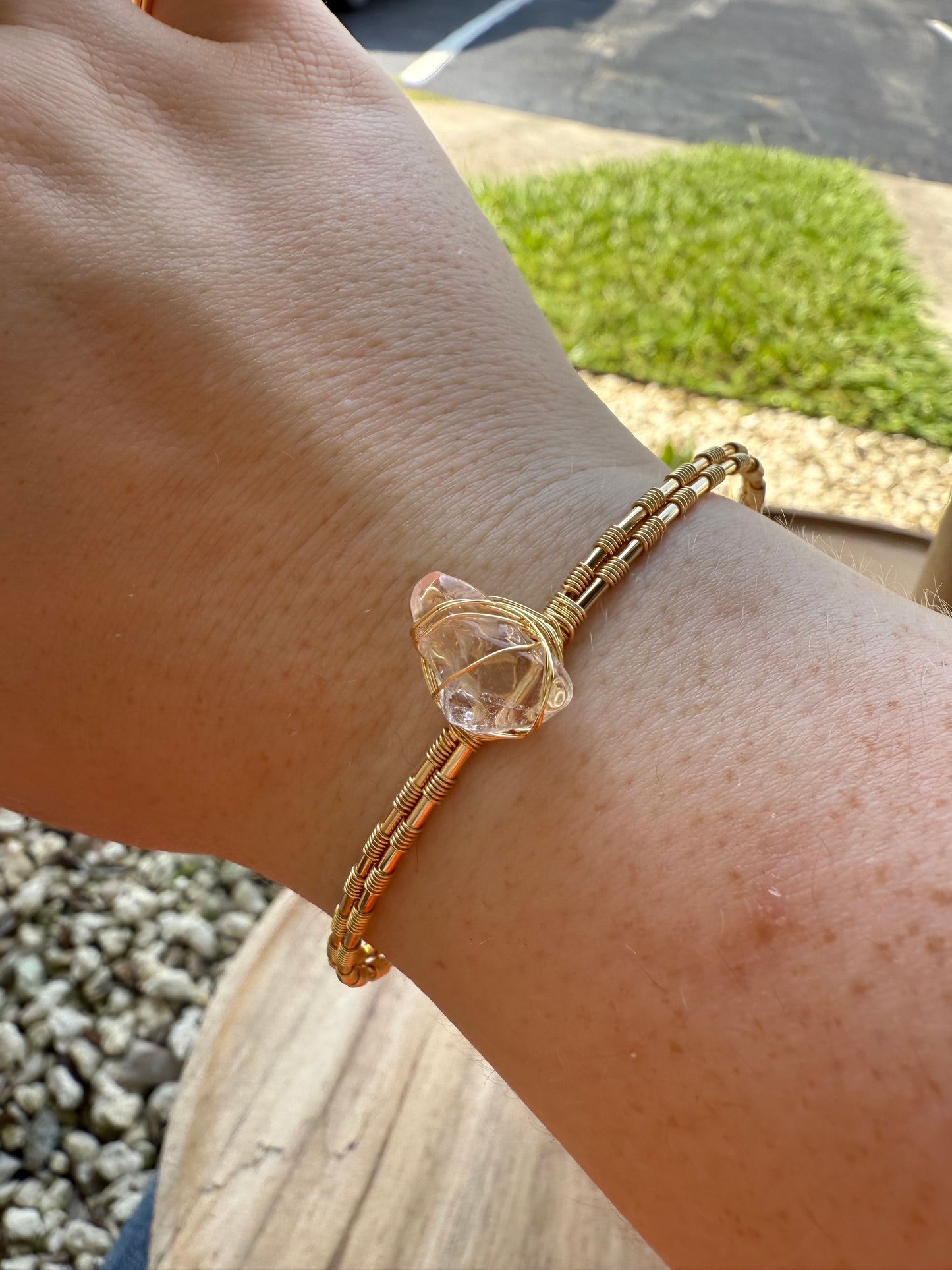 Bangle drop: gold clear quartz